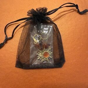 Women’s gold sun earrings